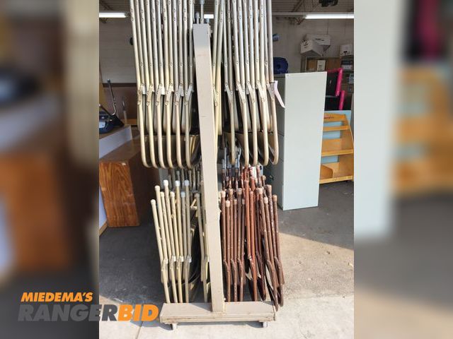 Lot 30-3852 - 70 Steel Chairs Lot includes approximately 70 chairs with rolling storage rack. Condition as is. Chairs were being used up until June 2024.