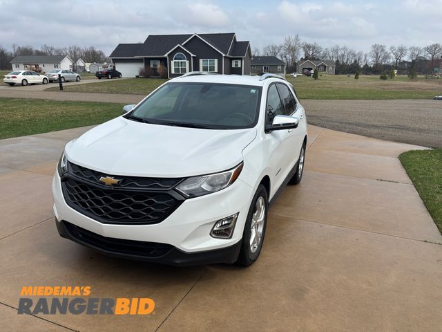 Lot 30-10309 - 2019 Chevrolet Equinox with a 1.5L L4 DIR DOHC 16V TURBO engine. Premier with 29,620 miles FWD