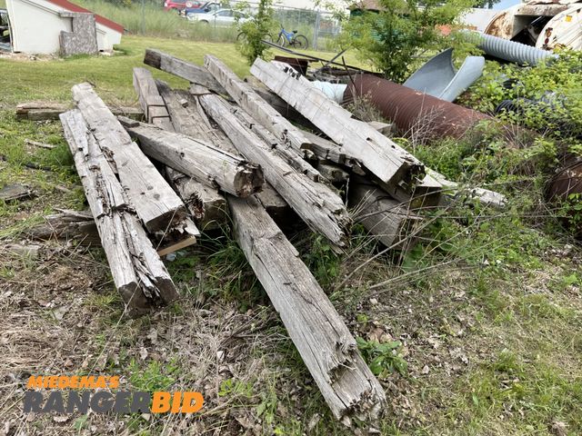 Lot 30-985 - Large pile of barn beams