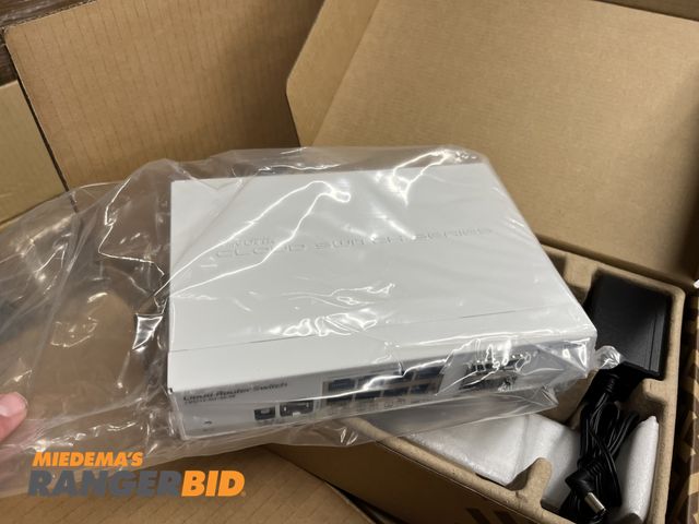 Lot 30-4207 - Pallet of Cloud  Router Switch, Some are new in the box with cords.