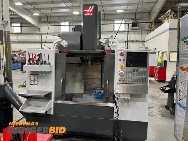 Lot 30-2645 - 2012 HAAS VF2 CNC Vertical Mill 24 tool changer. Does NOT come with turning tool.