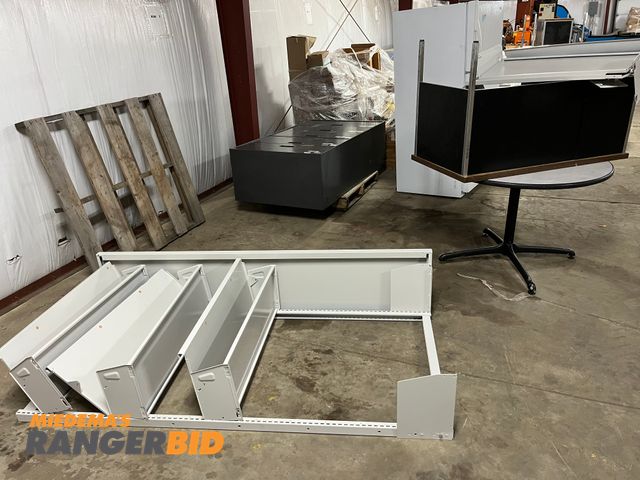 Lot 30-2224 - Lot includes metal bookshelf,, file cabinet, refridgerator, table, and desk