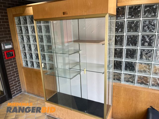 Lot 30-3351 - Display case with glass shelves. Buyer is responsible for removal.