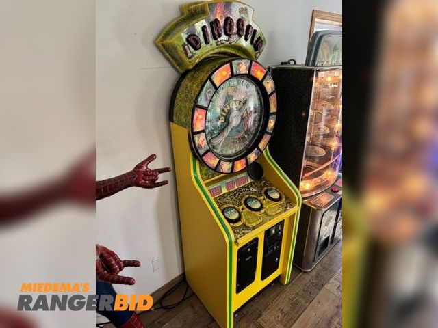 Lot 30-54604 - Dinospin ticket redemption arcade game manufactured by Five Star Redemption in 1996 or 1997.  
The g...