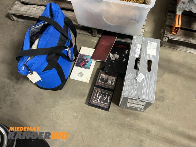 Lot 30-2523 - Lot includes HP printer, Doors Box Set, Pearl Limited edition, and a bag with yarn in it.