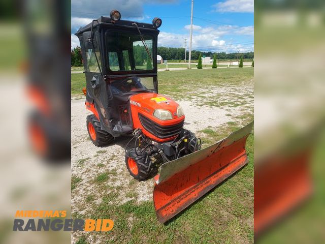Lot 30-10575 - 2011 Kubota BX 1860 Tractor with cab enclosure, 4 wd, 3 cyl, 18 hp diesel engine, hydrostatic foot c...
