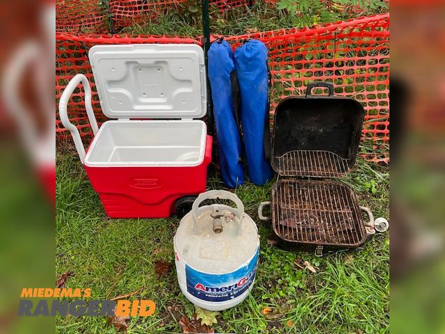 Lot 30-9793 - Lot Corroded but usable propane-powered hibachi grill. includes regulator hose and tank.  Includes rolling cooler and two (2) folding beach chairs. Propane Hibachi Grill