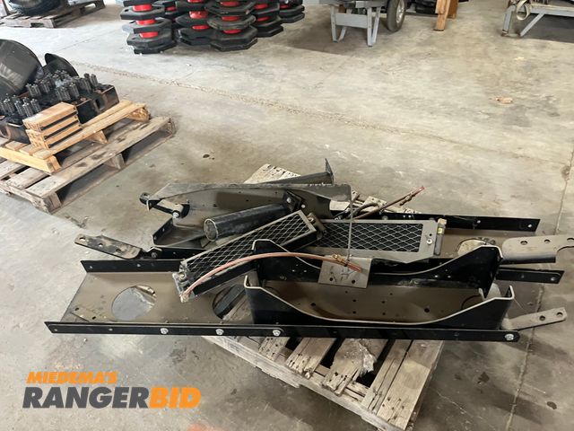 Lot 30-3913 - Truck frame cross rails and transmission cooler. Unknown what they fit. Seller will load.