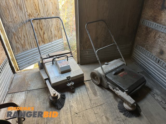 Lot 30-1016 - (2) Push Sweepers, one of them is a PowerBoss and the other is a Dayton. Said to run and operate whe...