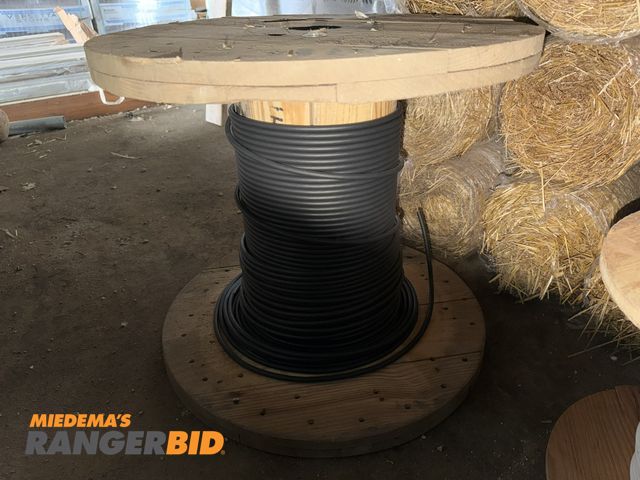 Lot 30-5713 - (1) partial spool of 7 strand rubber coated copper wire, no other info available.