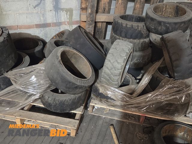 Lot 30-11487 - 5 Skids Solid Forklift Tires 5 skids of random Solid forklift tires.  These are old stock or takeoff...