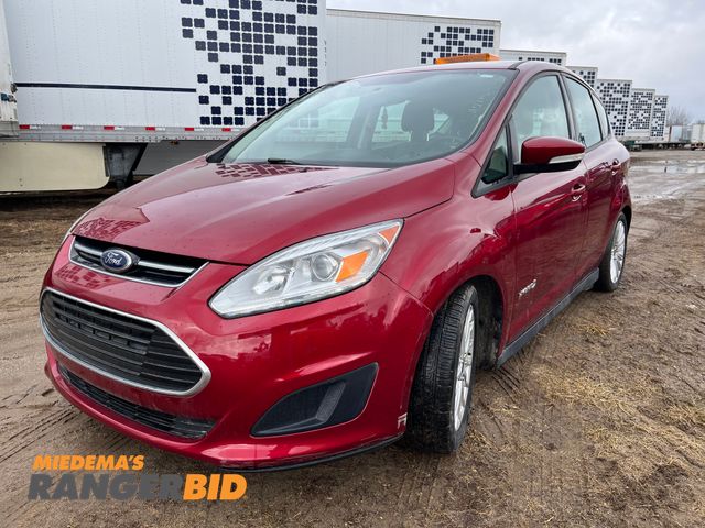 Lot 30-409 - 2017 Ford 2017 Ford C-Max Hybrid with a 2.0L L4 DOHC 16V HYBRID engine. SE Hybrid FWD