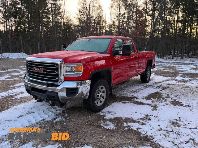 Lot 30-546 - 2017 GMC 2500HD with a 6.0L V8 OHV 16V FFV engine. Extended Cab Long Box Pickup Truck 4x4