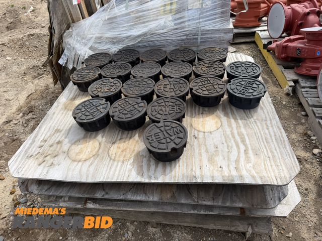 Lot 30-5790 - Lot of approx. (95) cast iron water main covers with 5 1/4" diameter connection.