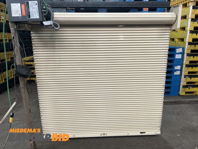Lot 30-30 - McKeon 6' x 6' motor operated roll-up fire door. 110v. Great working condition.