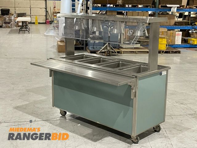 Lot 30-57 - Vollrath M37040-S535T-BIF Hot Food Table Catering Buffet w/ 4 Wells Enclosed Base 120V/208