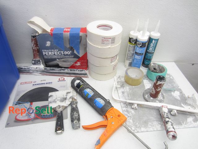 Lot 31-7157 - Drywall Tools &amp; Access: Drywall Tape, Caulk, Caulk Guns, Scrapers, etc.