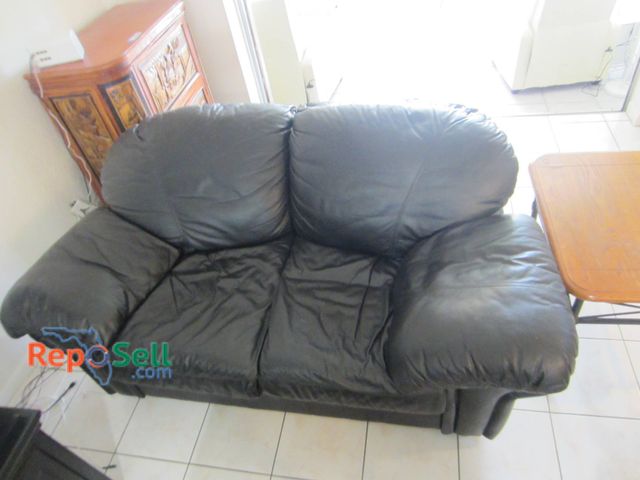 Lot 31-8657 - Black Pleather Loveseat Sofa 71"x33"x41"