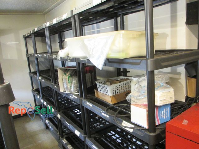 Lot 31-2092 - (4) Plastic Storage Racks (70"Hx35Wx23D each) and Contents: Storage Bags, Condiment Cups, etc. - Scr...