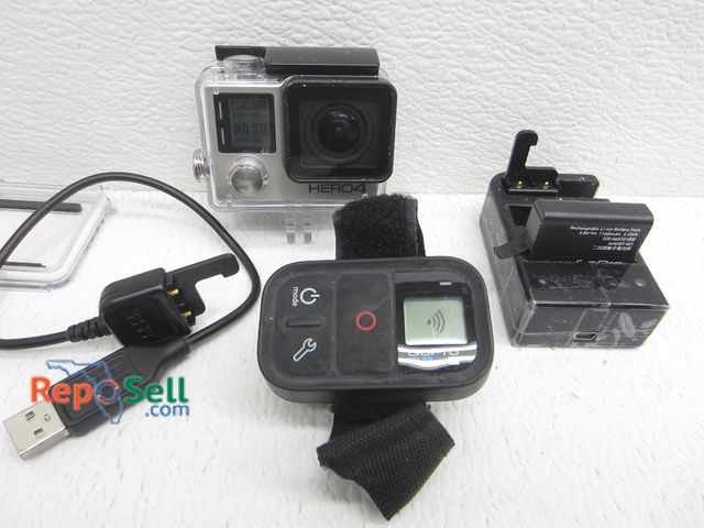 Lot 31-3060 - Go-Pro Hero 4 With Remote And Acces - Both Power On