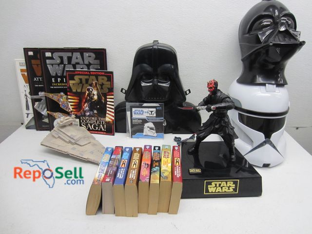 Lot 31-1362 - Star Wars collectibles: figures, cone trooper helmet, bank, etc. with 27-gallon tote