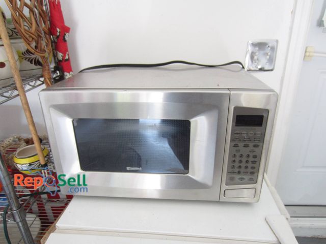 Lot 31-9135 - Kenmore Microwave Oven, Model 721.63263300, With Stainless Steel Finish, Featuring Keypad Controls A...