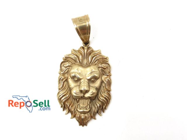 Lot 31-4000 - 10K Yellow Gold Lion Charm 7.68g total