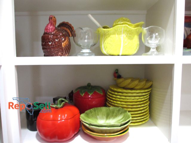 Lot 31-1332 - Kitchenware: Punch Bowl, Hand Painted Sunflower Dishes, Coasters, (2) Cookie Jars, etc.