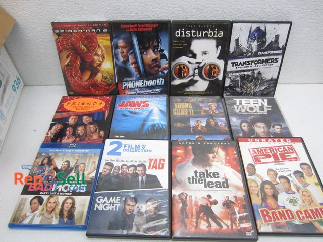 Lot 31-7413 - Lot of DVDs: Band Camp, Jaws, Spiderman, Disturbia, etc.