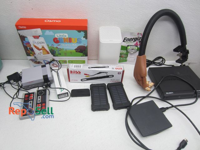 Lot 31-1155 - Electronics Lot: Rearview Camera, Little Genius Starter Kit, (2) Powers Banks, Power Cords, etc.