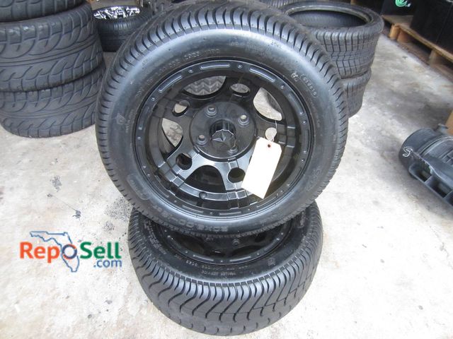 Lot 31-1257 - (2) New 4-Lug CST 20x9.00-12 ST Tires With Black Rims For Epic 12 Inch Golf Carts