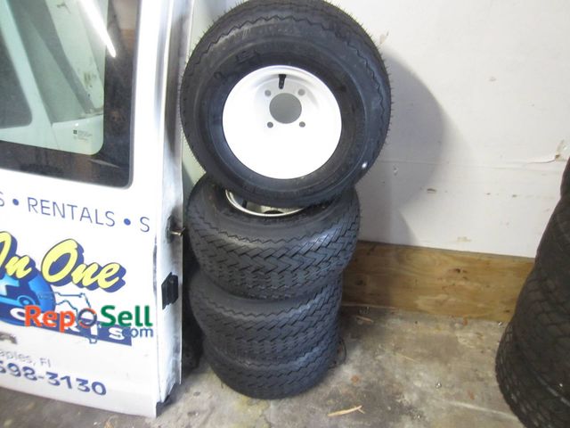 Lot 31-1271 - (4) New Kenda 8-Inch Golf Cart Tires With White Steel Wheels, 4-Ply Rating