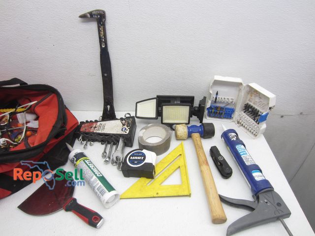 Lot 31-5407 - Milwaukee Tool Bag w/Tools &amp; Accessories: Pry Bar, Drill Bits, Wrenches, etc.