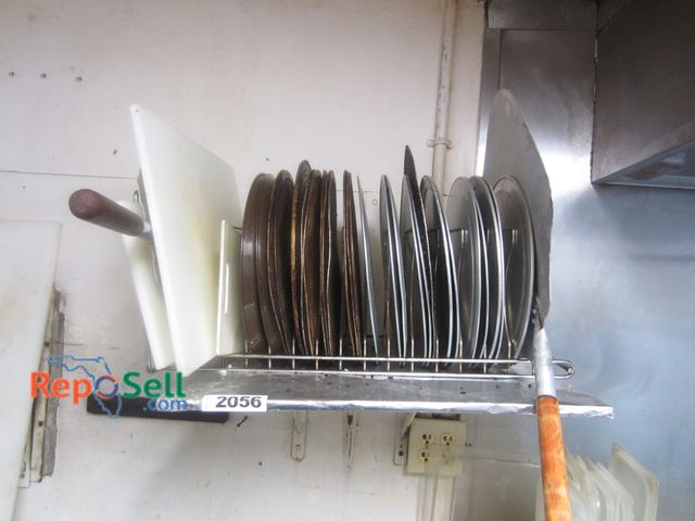 Lot 31-2056 - Assorted Pizza Pans, (3) Racks - Pizza, Wall &amp; Pan Separator, (2) Pizza Spatulas, etc. - BUYER M...