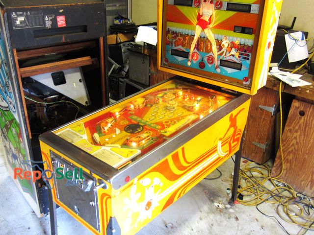 Lot 31-1177 - Bally Strikes &amp; Spares Pinball Machine with keys. Powers on,  Score/ counters did not power on.
