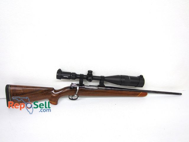 Lot 31-2325 - Sporterized Mauser 7x57mm with Sniper 6-24x50 Scope includes case.  21" Barrel. Polished bolt.