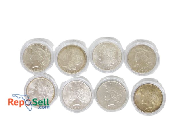 Lot 31-3042 - (8) 1 oz. Silver Dollars: (3) Morgan 1896, 1921S, 1921D and (5) Peace 1922, 1923, 1923S, 1935S - All...