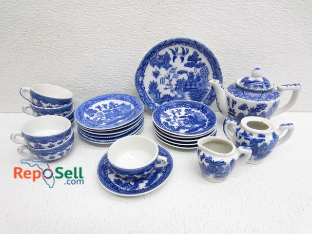 Lot 31-7098 - (24)pc Blue Willow Tea Set
