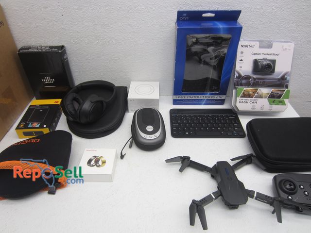Lot 31-7317 - Electronics Lot: Dash Cams, Drone, Smart Ring, Plugs etc