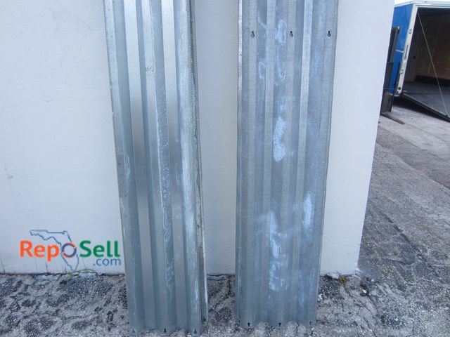 Lot 31-3154 - (14) 115" Metal Storm/Hurricane Shutters
