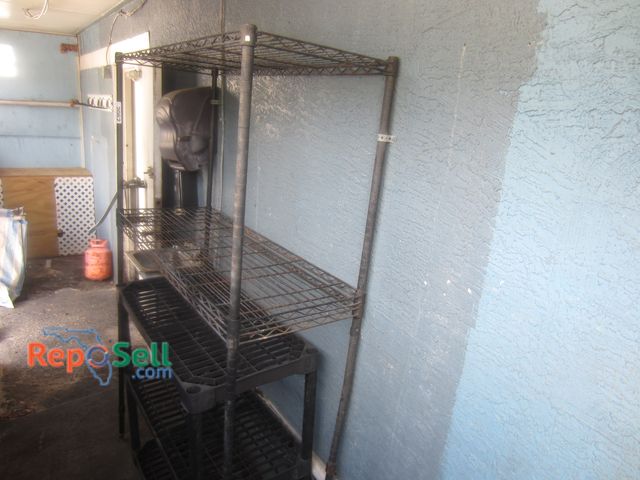 Lot 31-2062 - (2) Storage Racks: 1- Metal, 24"H x 18"D x 48" W, 1- Plastic, 36"H x 36"W x 18"D