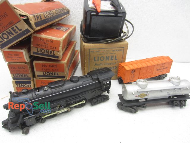 Lot 31-6122 - (7) Lionel Trains in Boxes &amp; (1) Transformer 1033