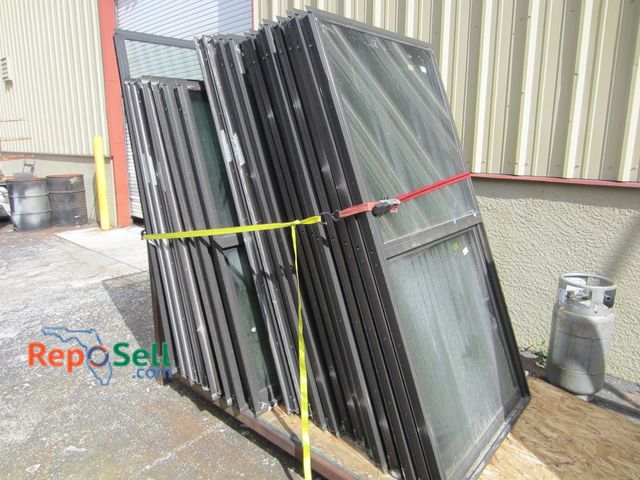 Lot 31-8353 - (21) Aluminum Window Inserts With Metal L-Shaped Glass Stand: (13) 72"x37"-185, (7) 63"x53"-185 And ...