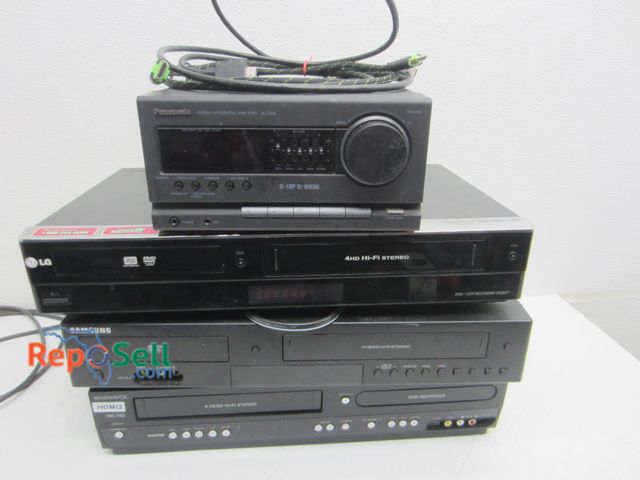 Lot 31-2438 - LG VHS/VCR Recorder, Samsung VHS/VCR Recorder, Magnavox (All 3 Power On), Panasonic Amplifier (No Po...