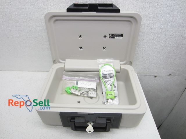 Lot 31-2393 - Small Sentry Safe with Key &amp; Locks - Model 1100