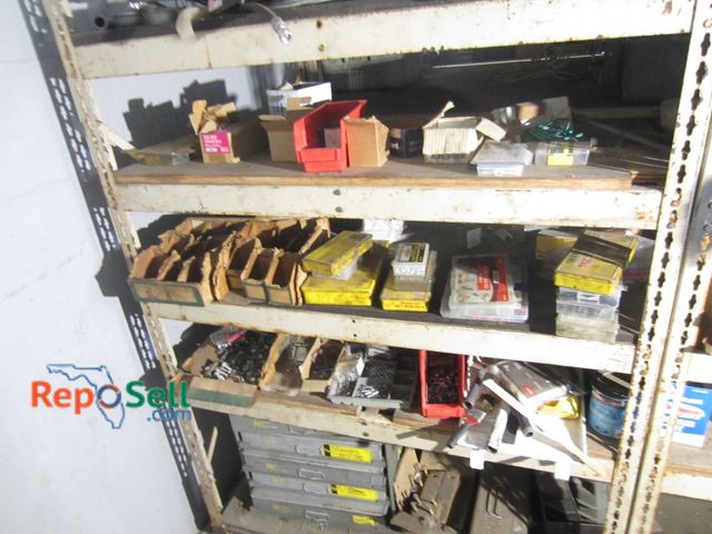 Lot 31-1296 - The Contents Of Shelves Containing Various Tools, Hardware Fasteners, Paint Cans, And Boxes. Include...