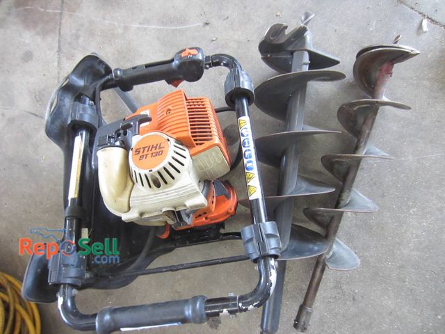 Lot 31-1373 - Stihl BT 130 gas-powered earth auger featuring an orange and black design and a 4-MIX engine. Includ...