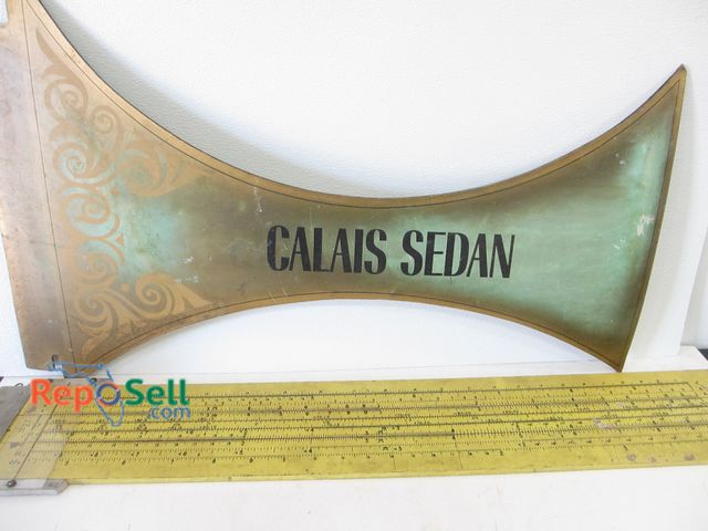Lot 31-1313 - Large Ruler and Sedan Deville Sign