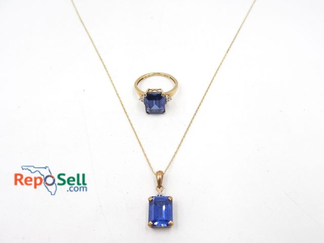 Lot 31-9014 - 10K Yellow Gold Sapphire Ring Size 4.75 and Matching 10K Sapphire Pendant and 17" Chain - 4.08g tota...