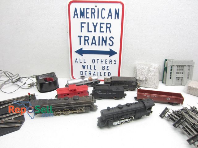 Lot 31-4143 - Modern American Flyer Trains Set w/Metal Sign: Engines 21100 &amp; 322, (6) Straight, (20) Curved Tr...